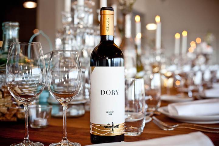 a bottle of wine and glasses in Portugal