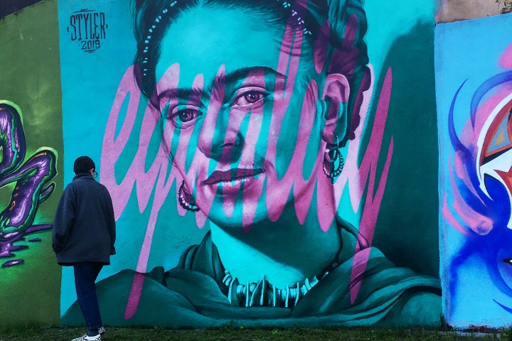 Frida Kahlo portrait street art on a wall in Lisbon