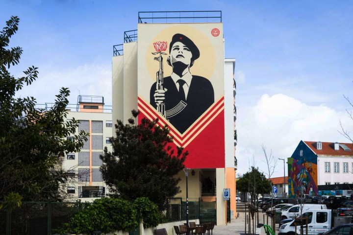 a sign on the side of the street