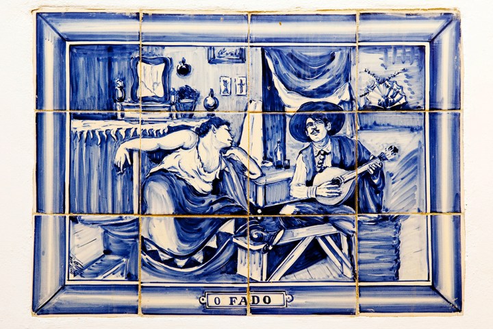 a painting of a blue bench